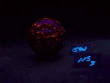 Load image into Gallery viewer, Fluorescent Yooperlite 64mm Sphere for Collection or Home Decor NS3