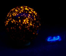 Load image into Gallery viewer, Fluorescent Yooperlite 64mm Sphere for Collection or Home Decor NS3
