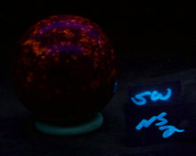 Load image into Gallery viewer, Fluorescent Yooperlite 64mm Sphere for Home Decor or UV Collection NS2
