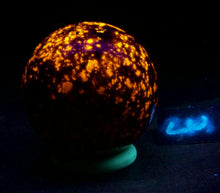 Load image into Gallery viewer, Fluorescent Yooperlite 64mm Sphere for Home Decor or UV Collection NS2
