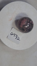 Load and play video in Gallery viewer, Rhodonite 38mm Interior Decor Semi Precious Gemstone Sphere/Home or Office 6592
