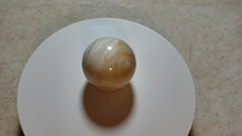 Load and play video in Gallery viewer, Fluorescent Montana Orange Calcite 35mm Sphere for Collection  Decor or Gft 5230
